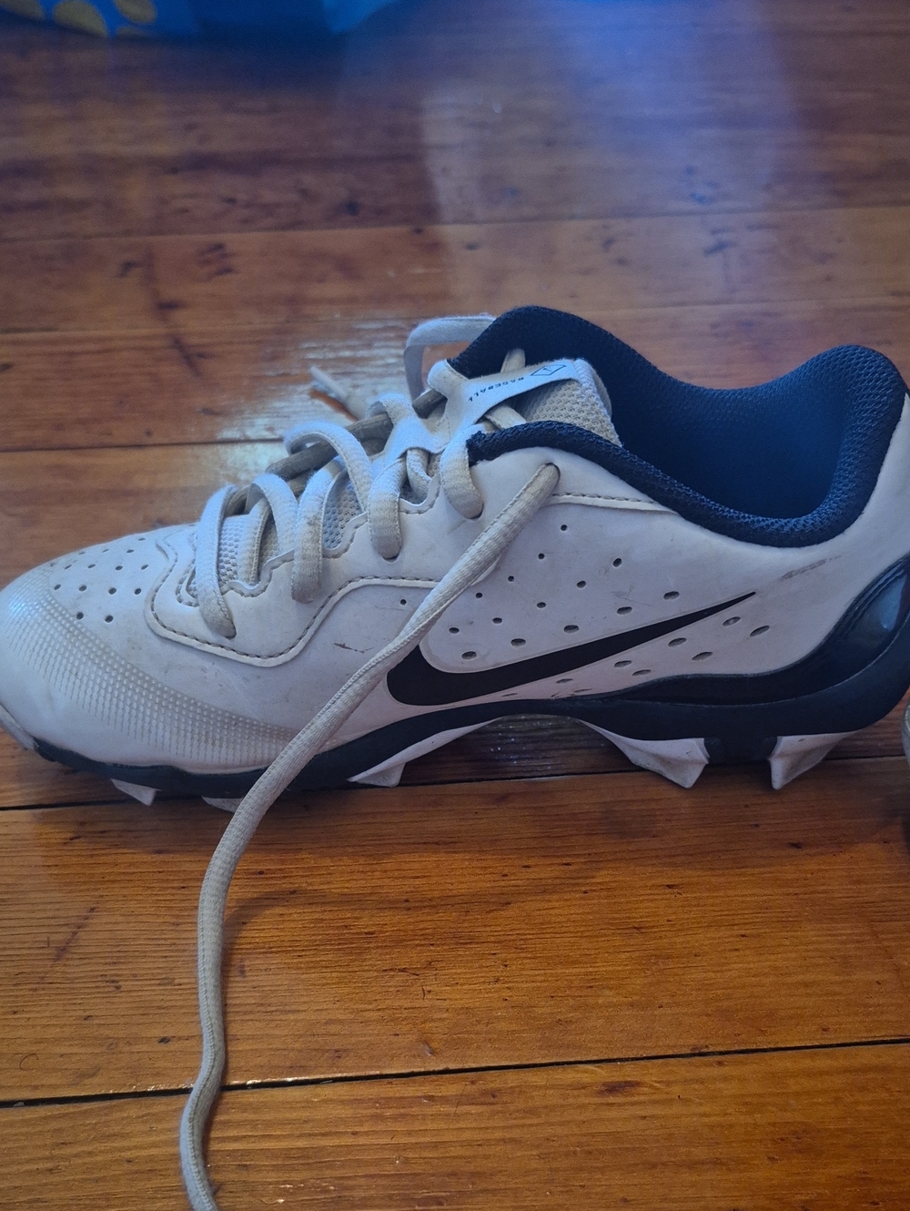White and Black Baseball Cleats - Nike Size 2